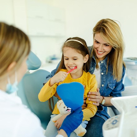 An older man happy with his complete dental implant